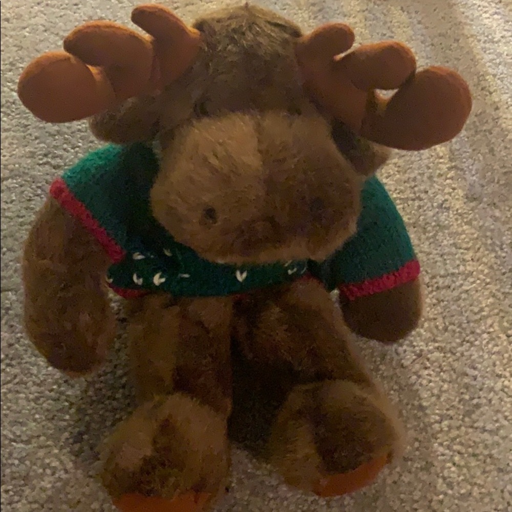 Stuffed moose with holiday sweater